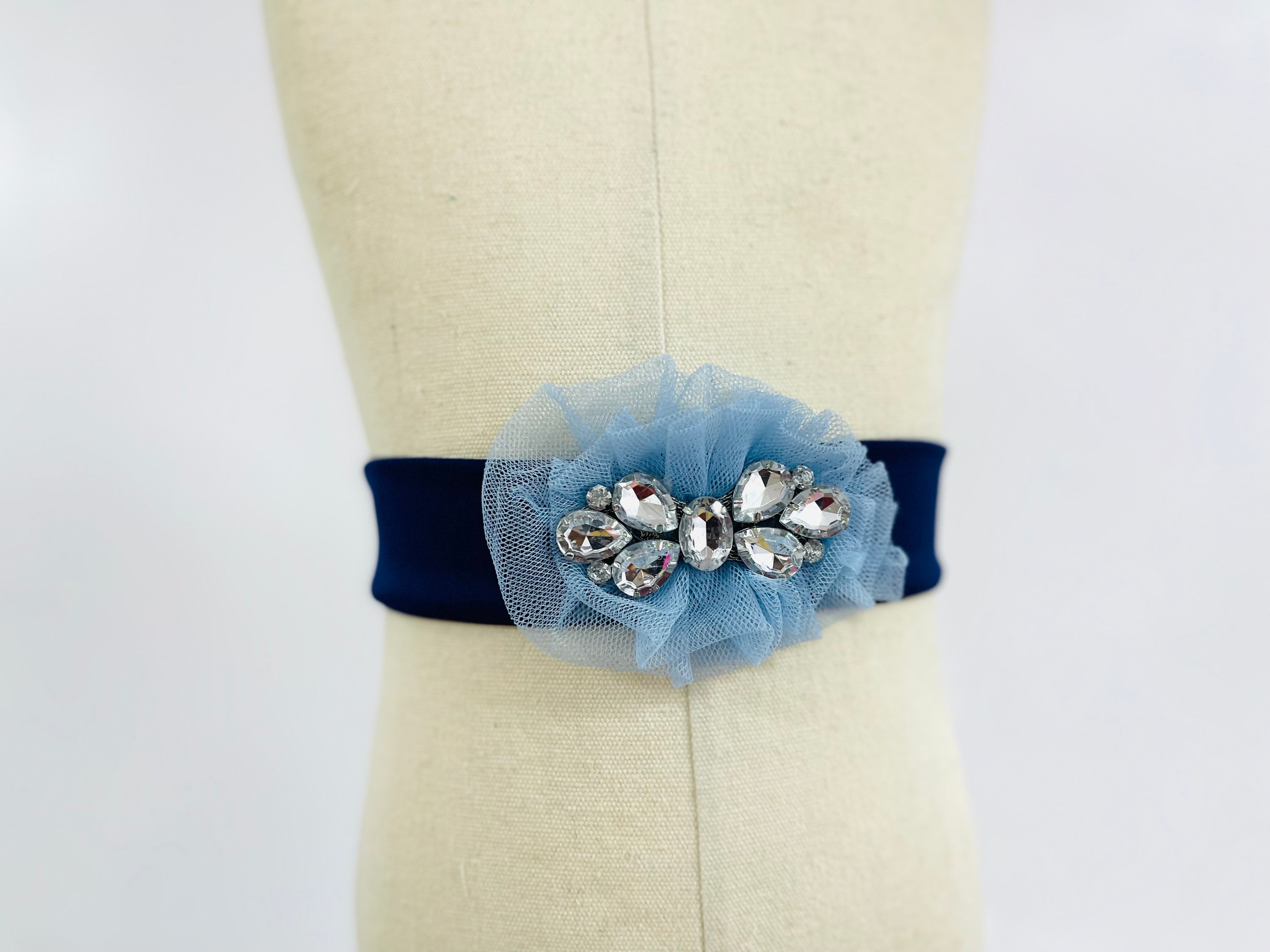 Ixora Belt featuring a bejewel tulle ruffle bow, elegantly designed for a sophisticated look.