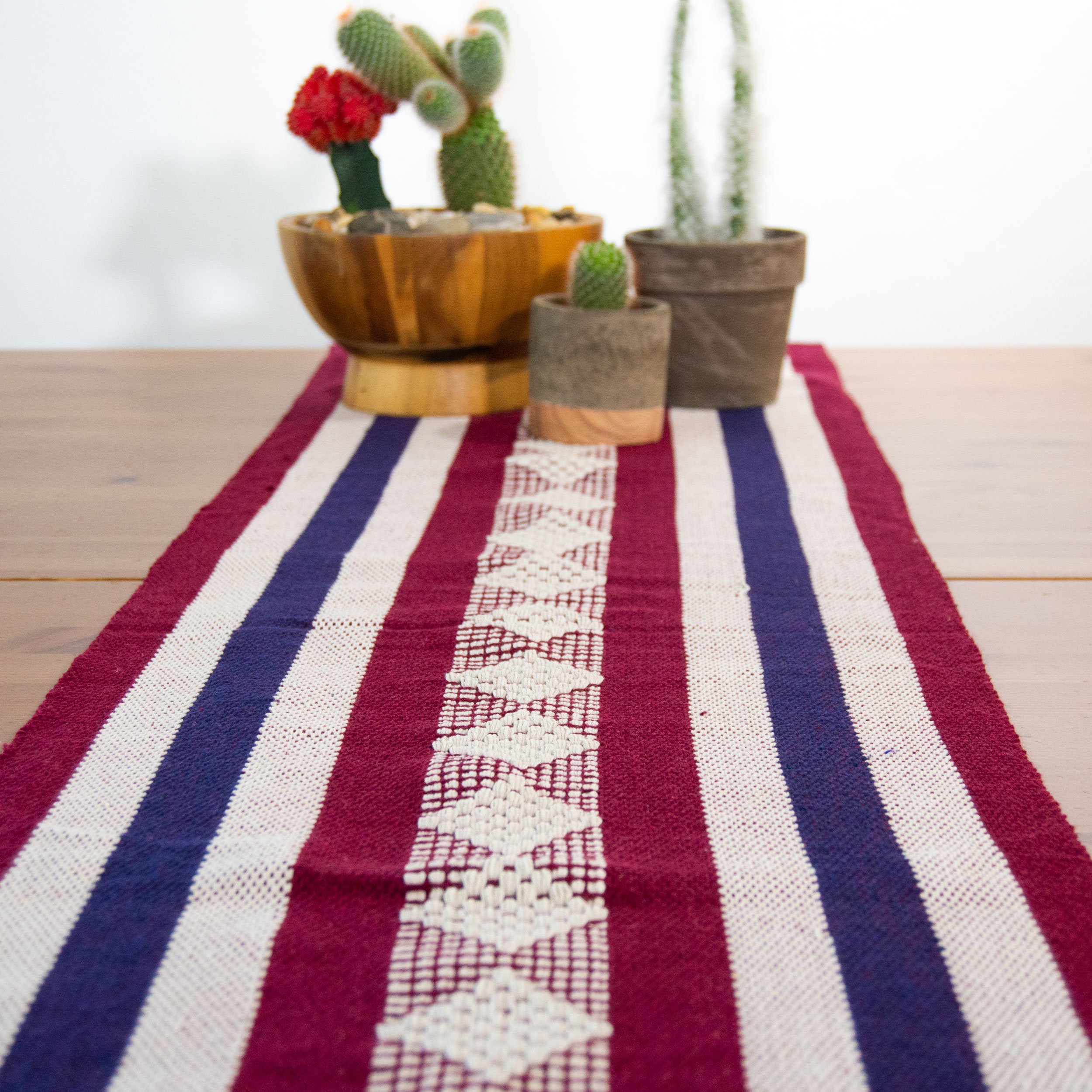 Jalieza Geometric Woven Table Runner featuring a diamond design in blue, handmade in Oaxaca, Mexico.