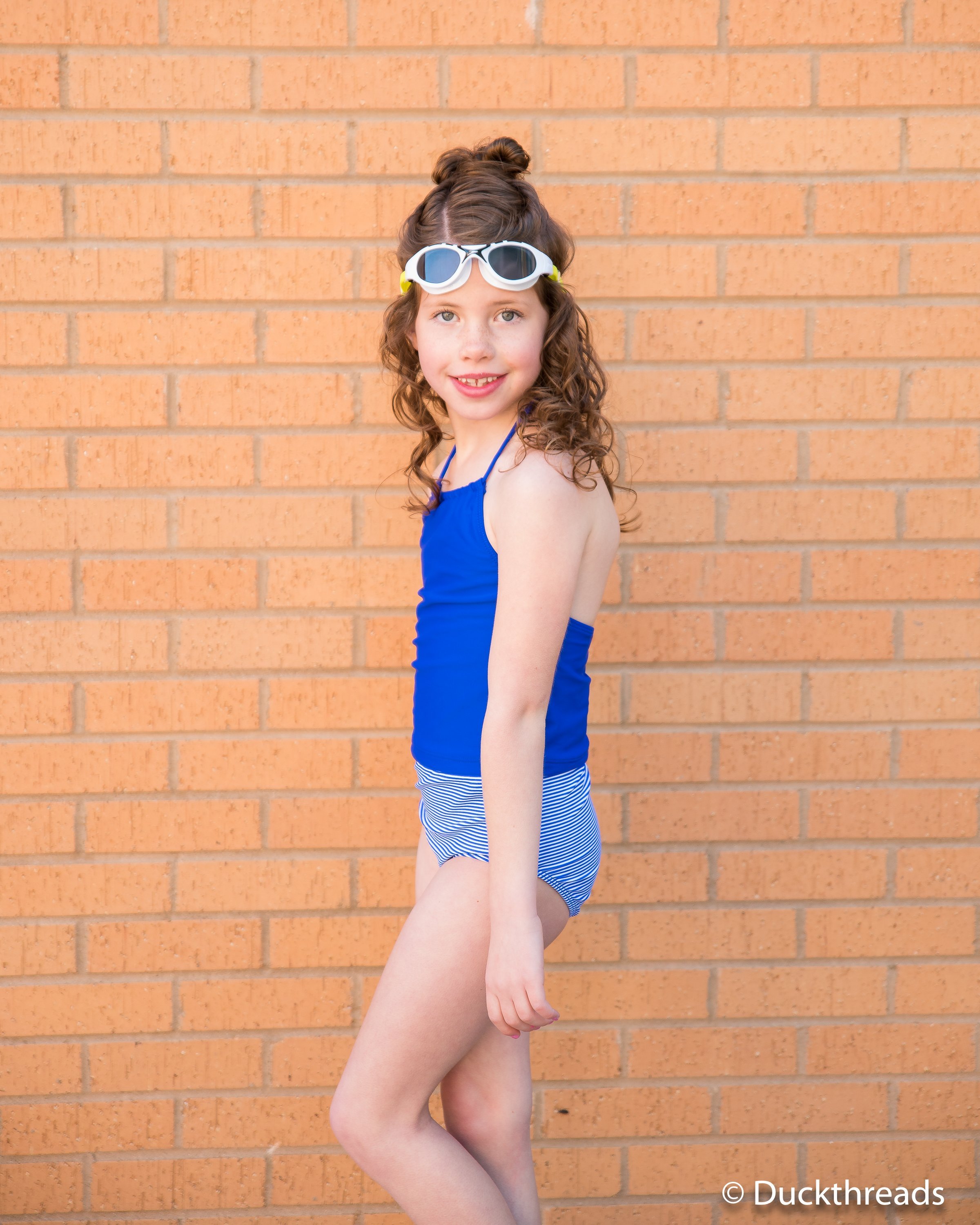 Janela Bay Royal Blue Swim Top featuring a halter neck design and crop top style, perfect for summer beach outings.