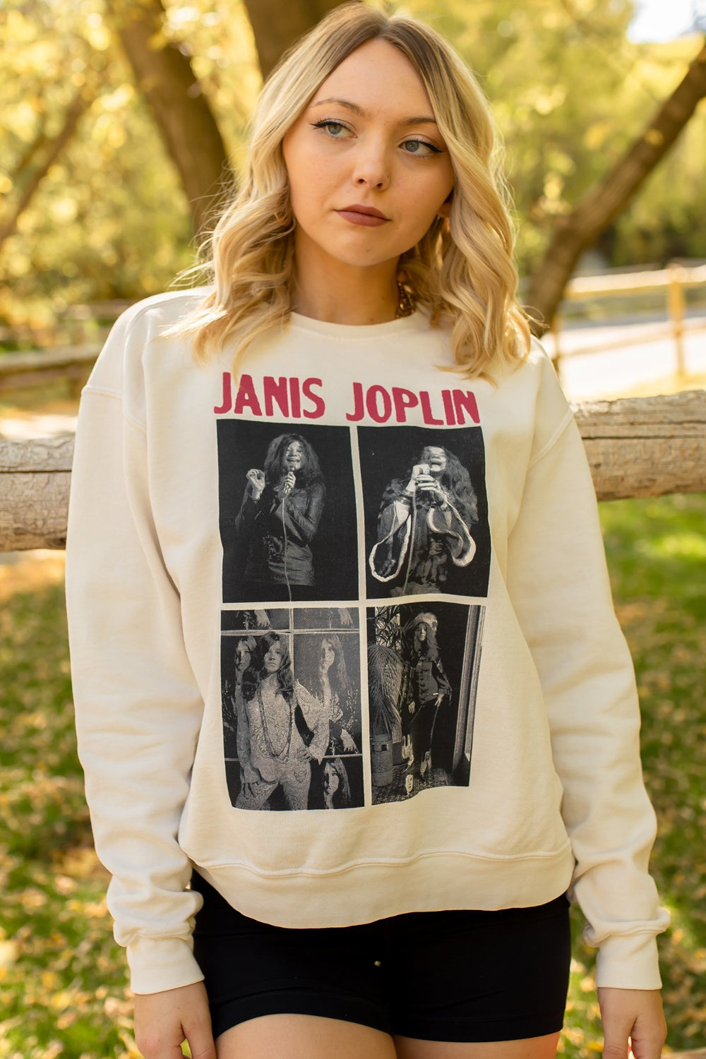 Ivory Janis Joplin sweatshirt featuring a graphic of the iconic singer, with raglan cuffed sleeves and a crew neck design.