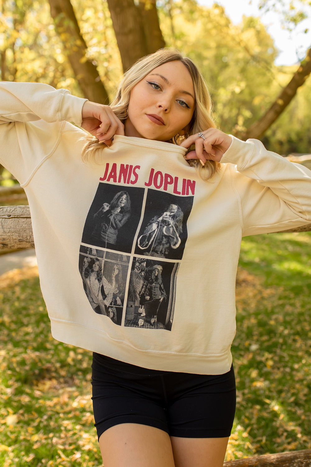 Ivory Janis Joplin sweatshirt featuring a graphic of the iconic singer, with raglan cuffed sleeves and a crew neck design.