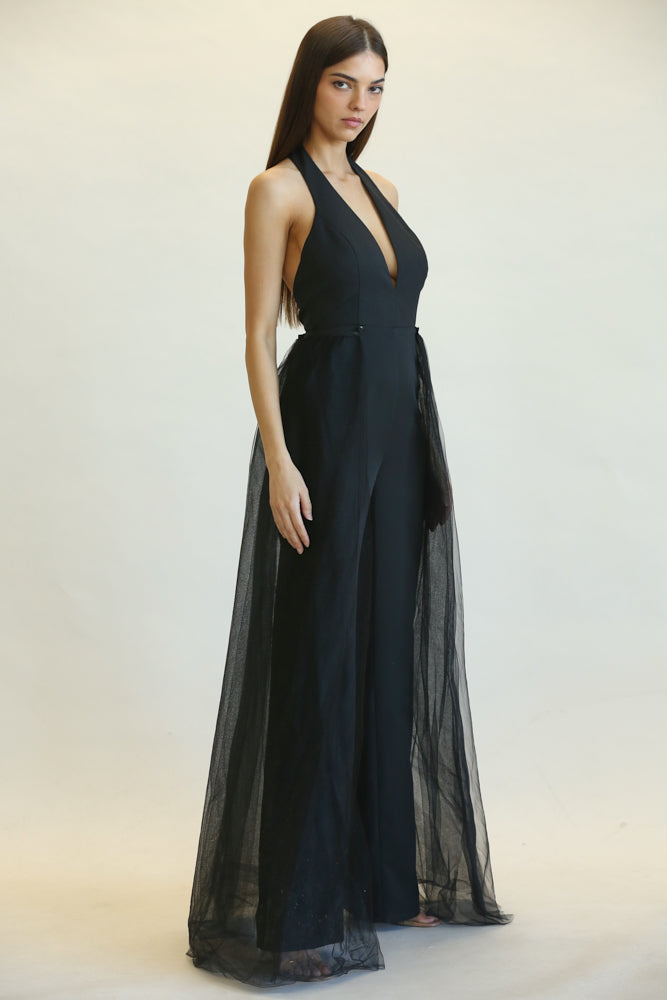 Jarka Halter Neckline Jumpsuit/Dress featuring a stylish halter neck, removable tulle skirt, and wide-leg pant fit.