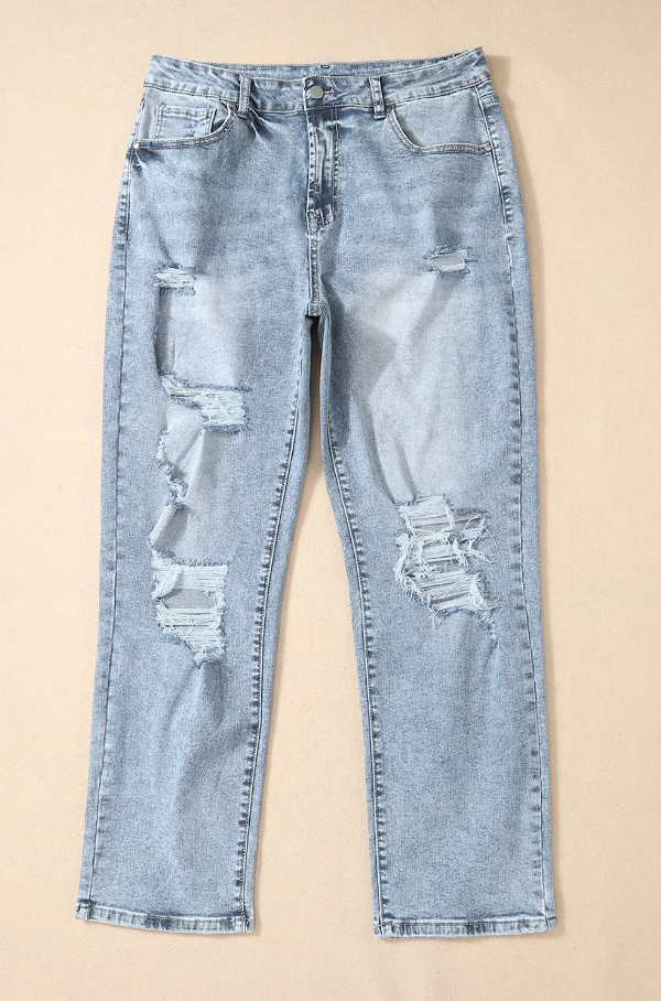 Light blue ripped jeans featuring a high waist, button and zipper closure, and side pockets, made from high-quality cotton.