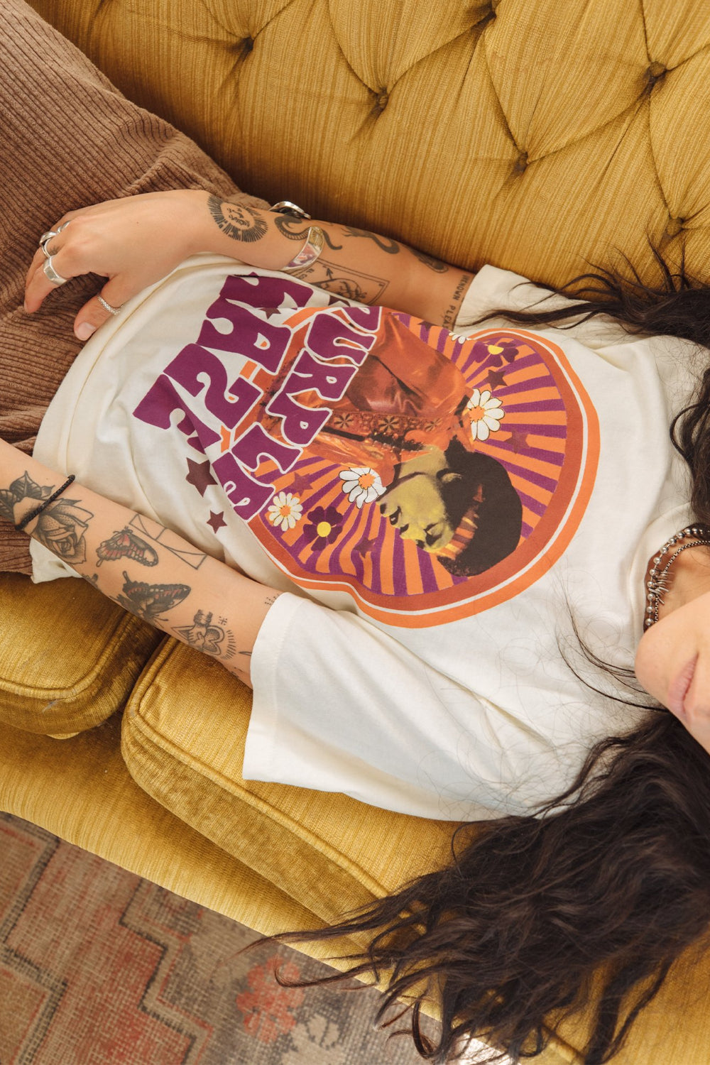 White Jimi Hendrix Purple Haze Tee featuring a vibrant graphic of Jimi Hendrix, made from 100% organic cotton.