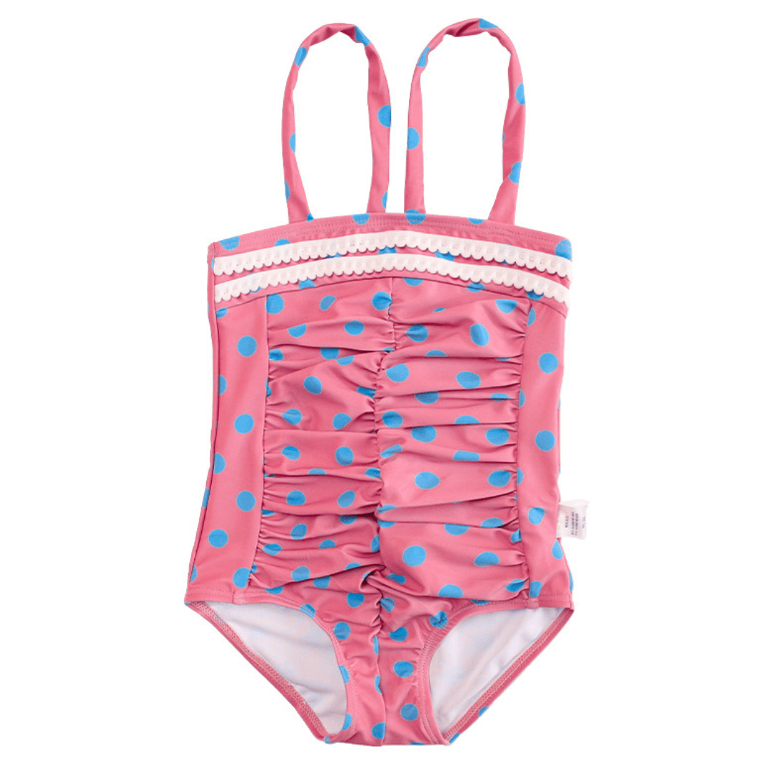 Joona swimsuit featuring a vibrant print and cute ruffles, perfect for girls at the beach or pool.