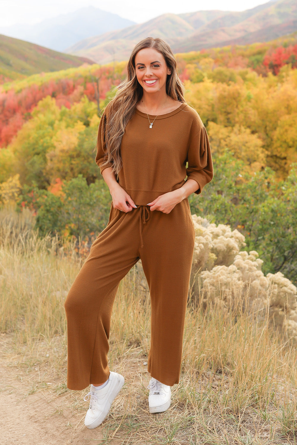 A pair of Journey Pants in brown, featuring a slouchy fit, cropped length, and drawstring waist, with pockets visible.