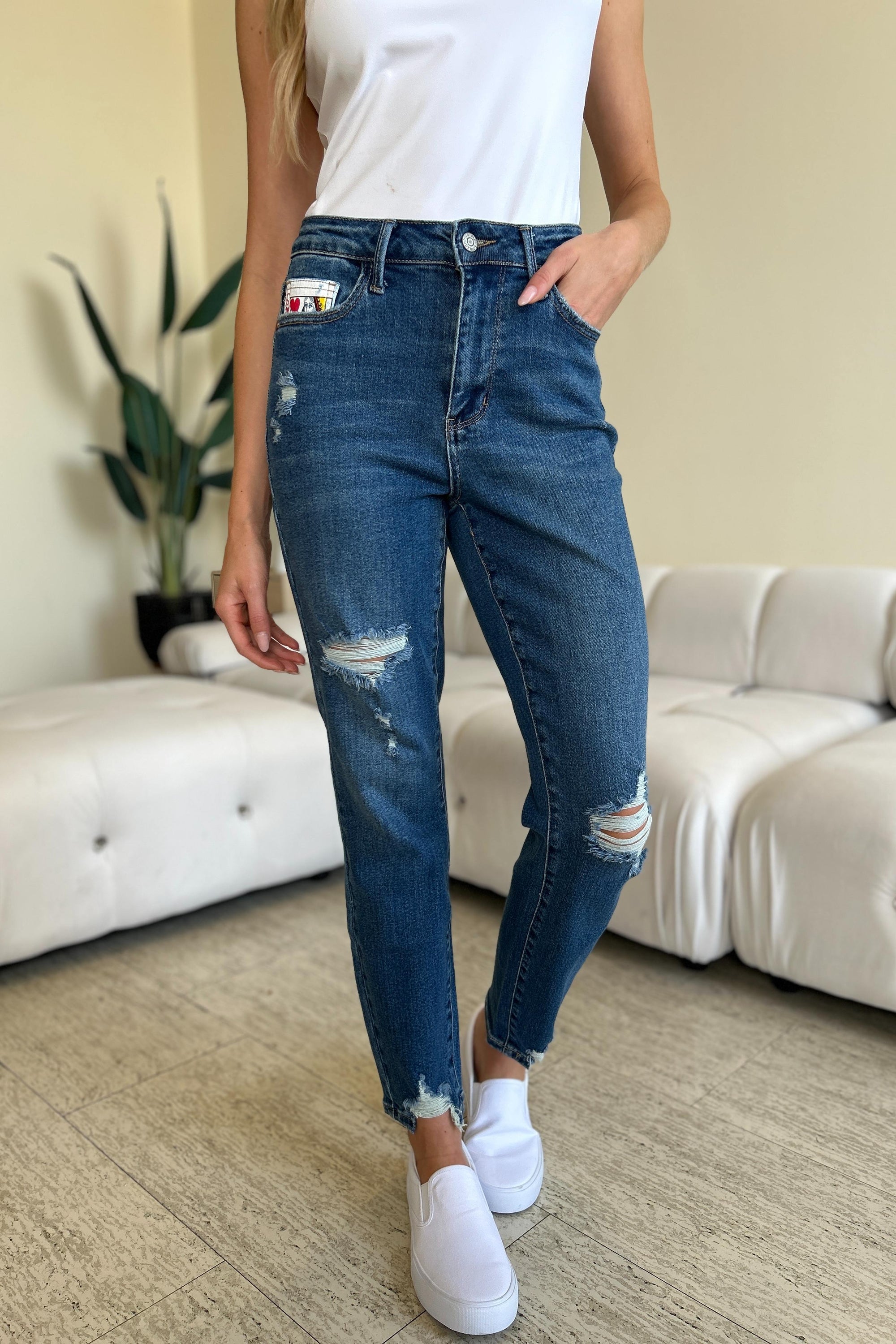 Judy Blue Full Size Queen Of Hearts Coin Pocket BF Jeans featuring a trendy distressed design and comfortable boyfriend fit.