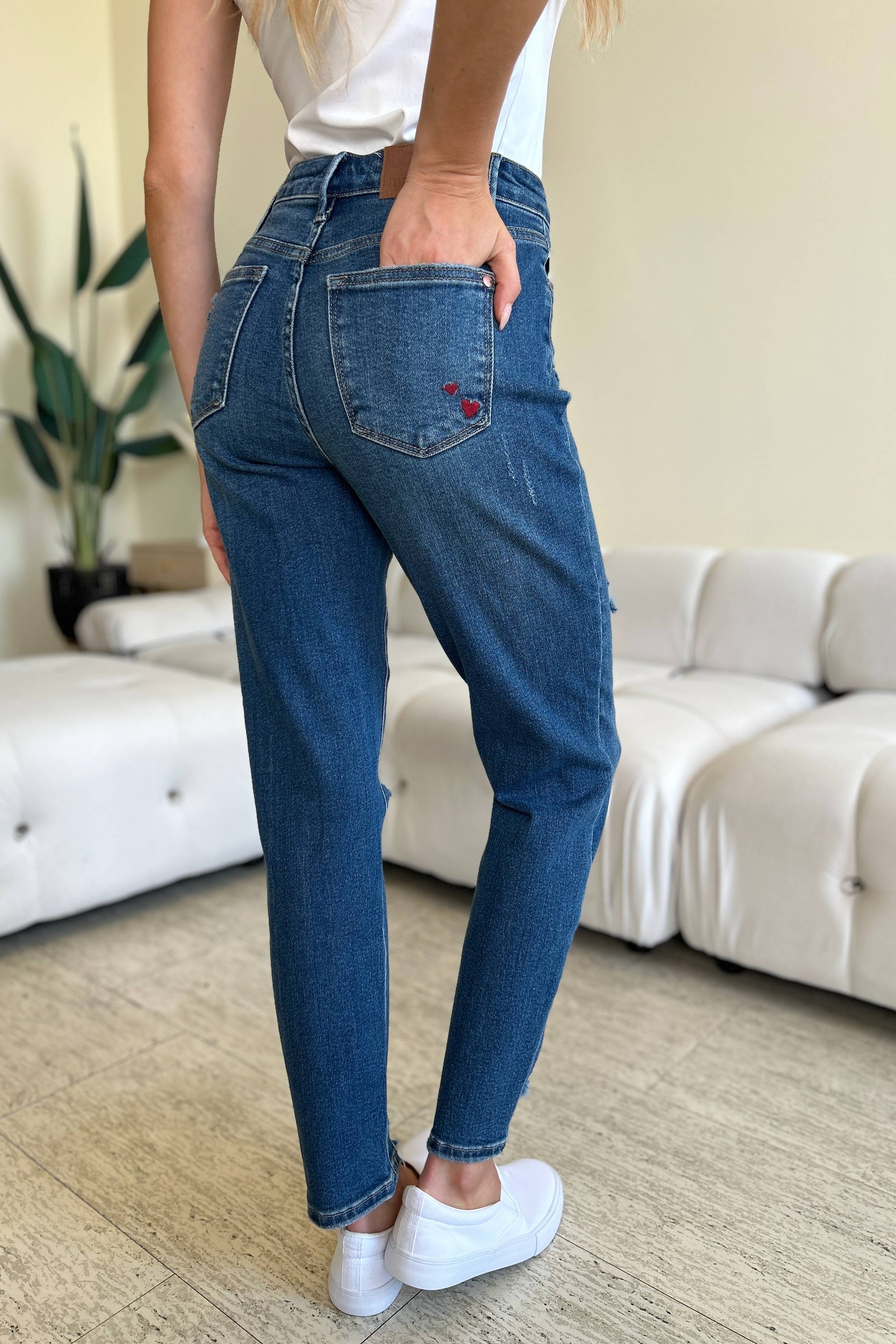 Judy Blue Full Size Queen Of Hearts Coin Pocket BF Jeans featuring a trendy distressed design and comfortable boyfriend fit.