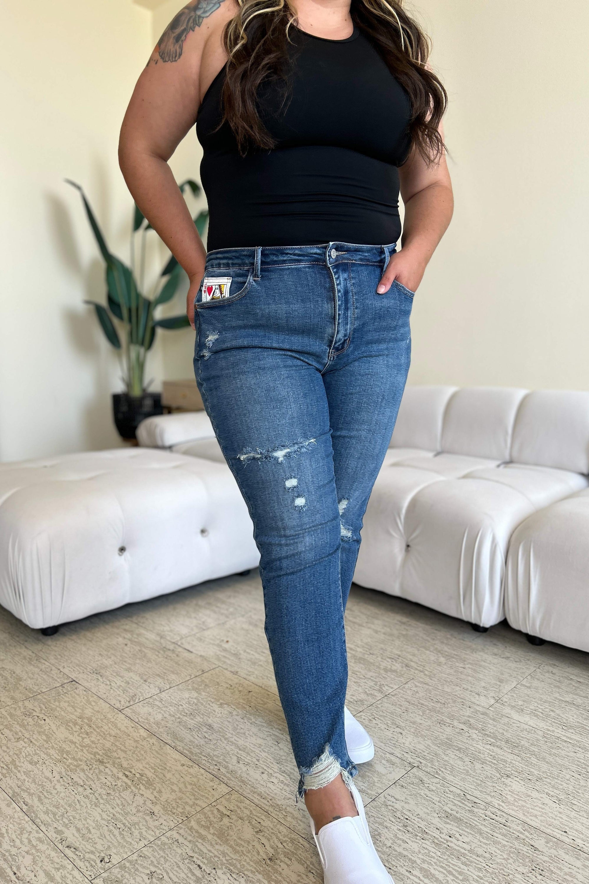 Judy Blue Full Size Queen Of Hearts Coin Pocket BF Jeans featuring a trendy distressed design and comfortable boyfriend fit.