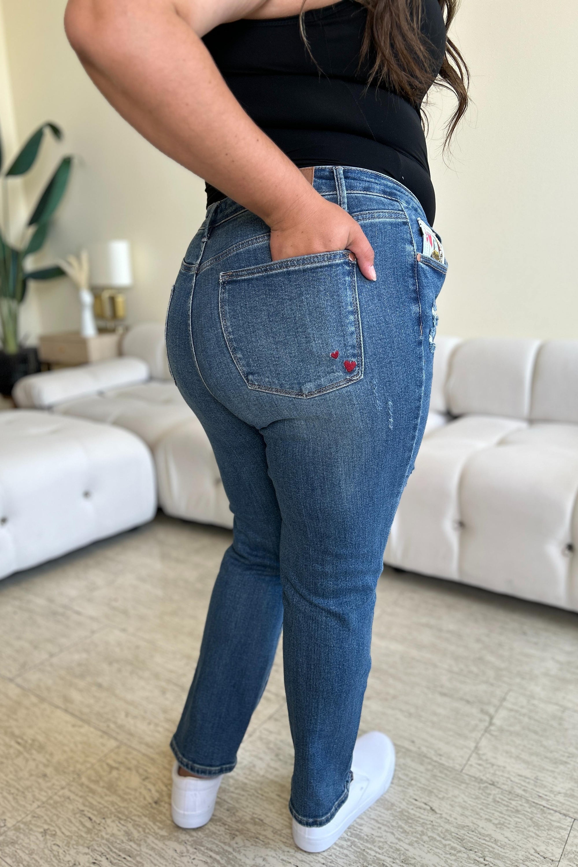 Judy Blue Full Size Queen Of Hearts Coin Pocket BF Jeans featuring a trendy distressed design and comfortable boyfriend fit.