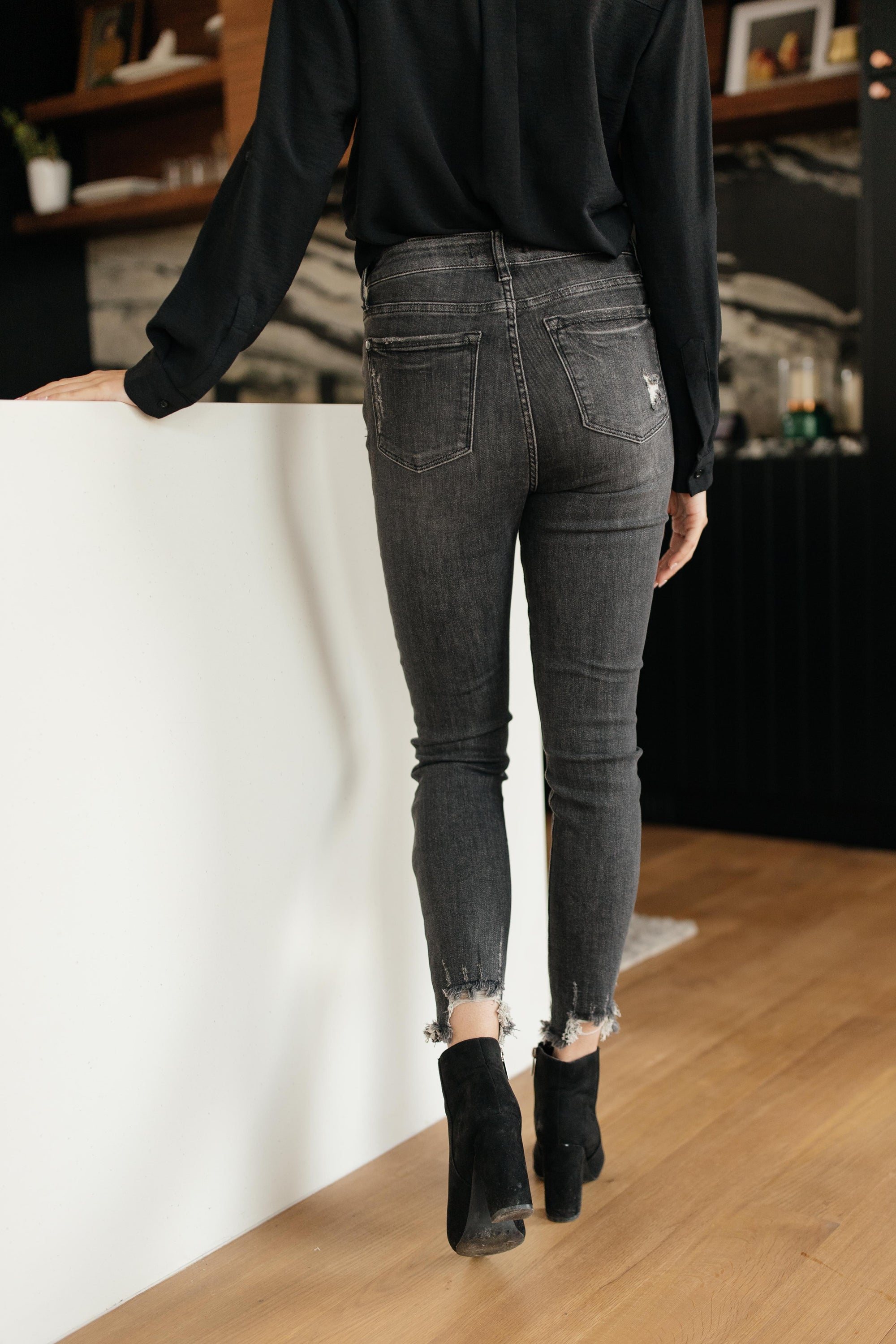 Judy Blue Gray Days Button Rise Jeans featuring a stylish button rise design, distressed detailing at knees, and functional pockets.