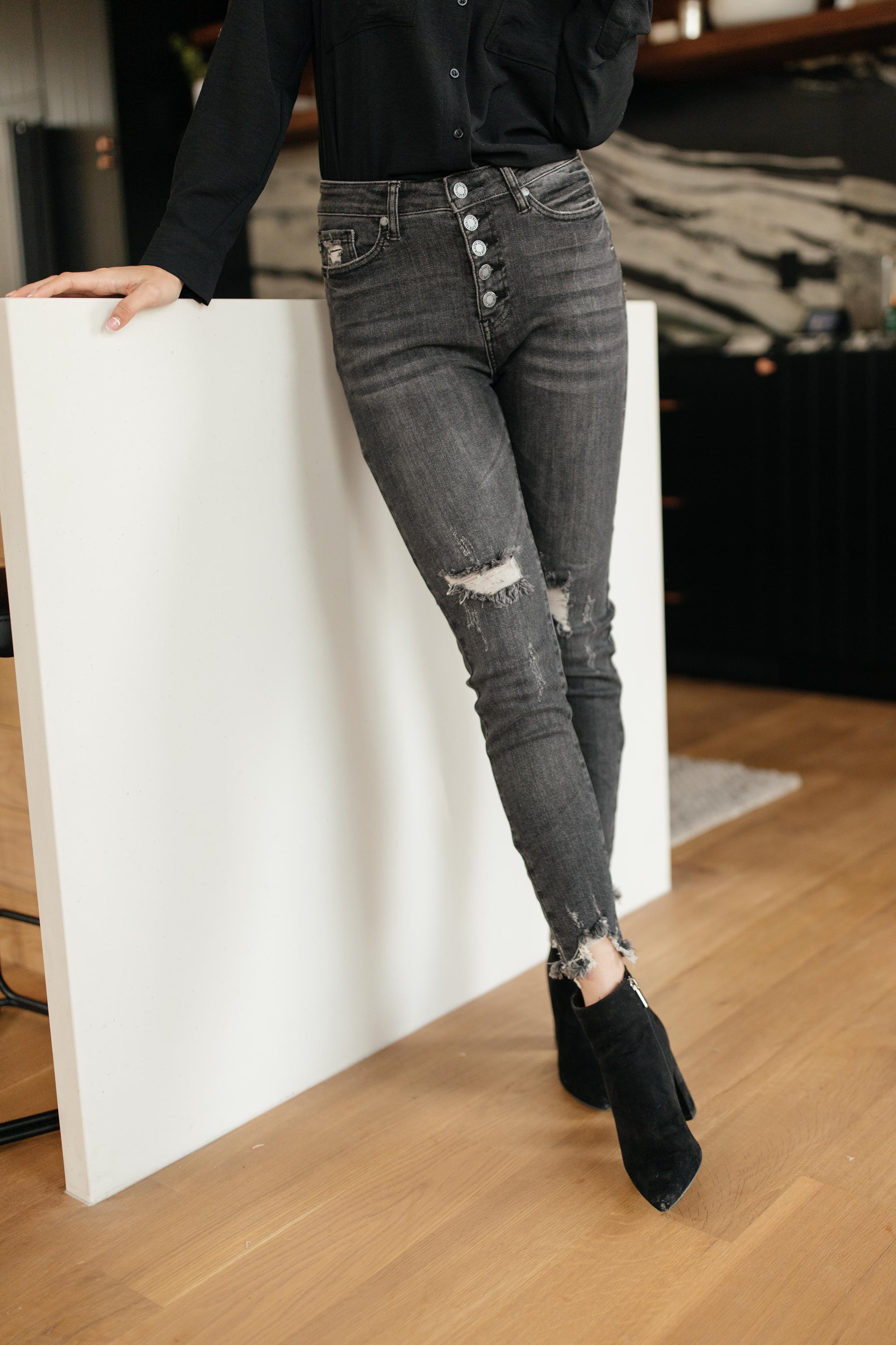 Judy Blue Gray Days Button Rise Jeans featuring a stylish button rise design, distressed detailing at knees, and functional pockets.