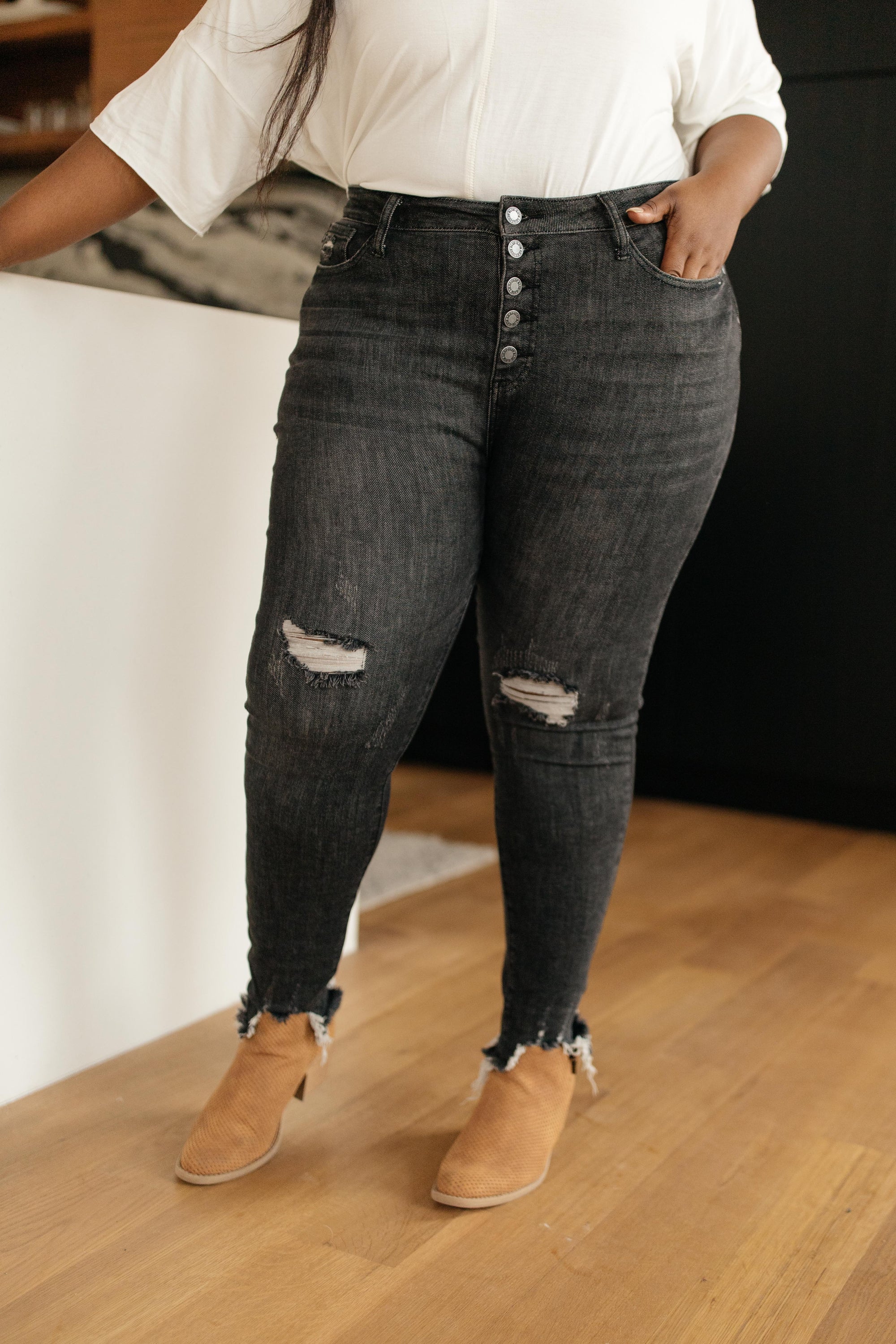 Judy Blue Gray Days Button Rise Jeans featuring a stylish button rise design, distressed detailing at knees, and functional pockets.