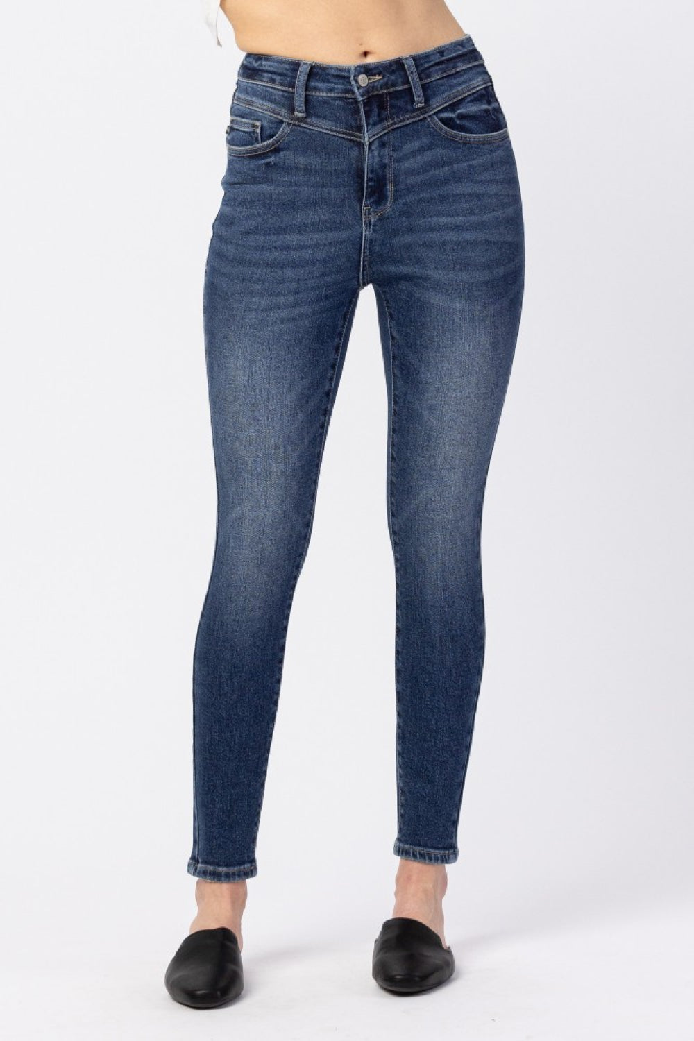 Judy Blue High-Rise Ankle-Length Jeans displayed on a model, showcasing the flattering fit and classic pocket design.