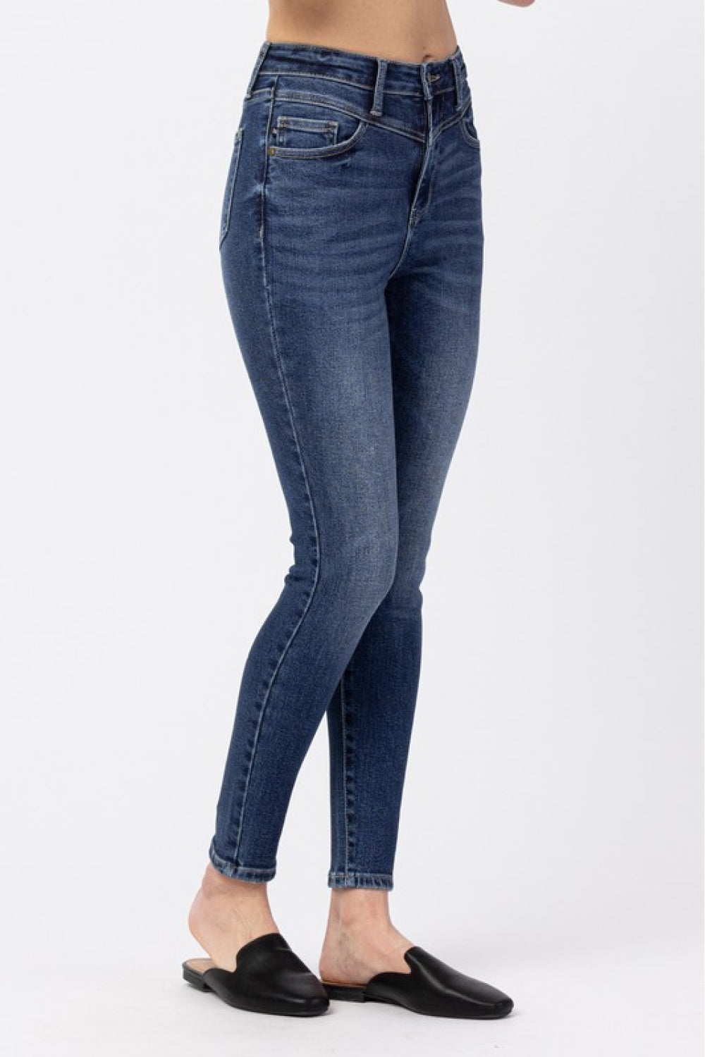 Judy Blue High-Rise Ankle-Length Jeans displayed on a model, showcasing the flattering fit and classic pocket design.