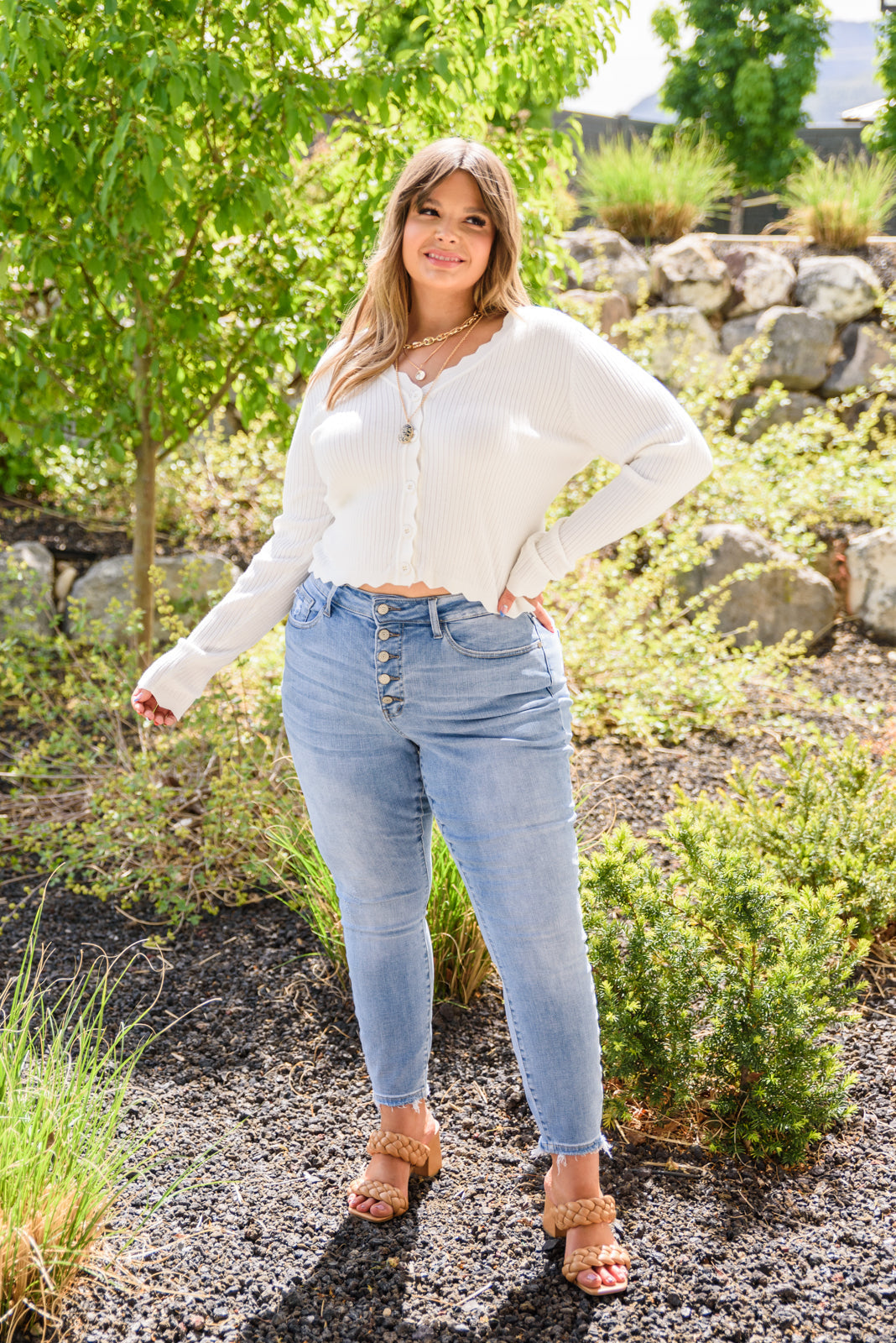 Judy Blue Hi-Rise Button Fly Skinny jeans in light wash, showcasing the button fly and five pocket design.