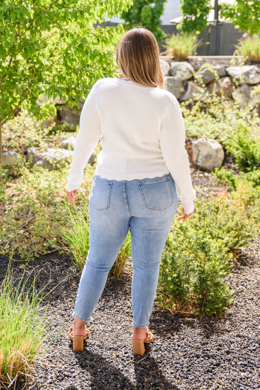 Judy Blue Hi-Rise Button Fly Skinny jeans in light wash, showcasing the button fly and five pocket design.