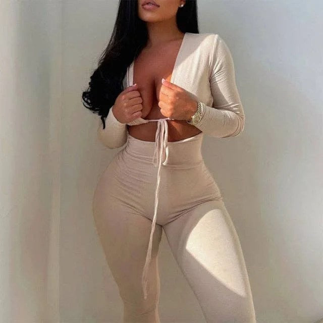 A stylish women's jumpsuit featuring a sexy hollow-out design, long sleeves, and a bodycon fit, perfect for high street fashion.