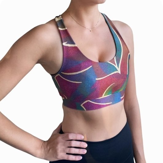 Jungle Sports Bra featuring a chic scoop neck and crossed back design with a jungle print, ideal for workouts.