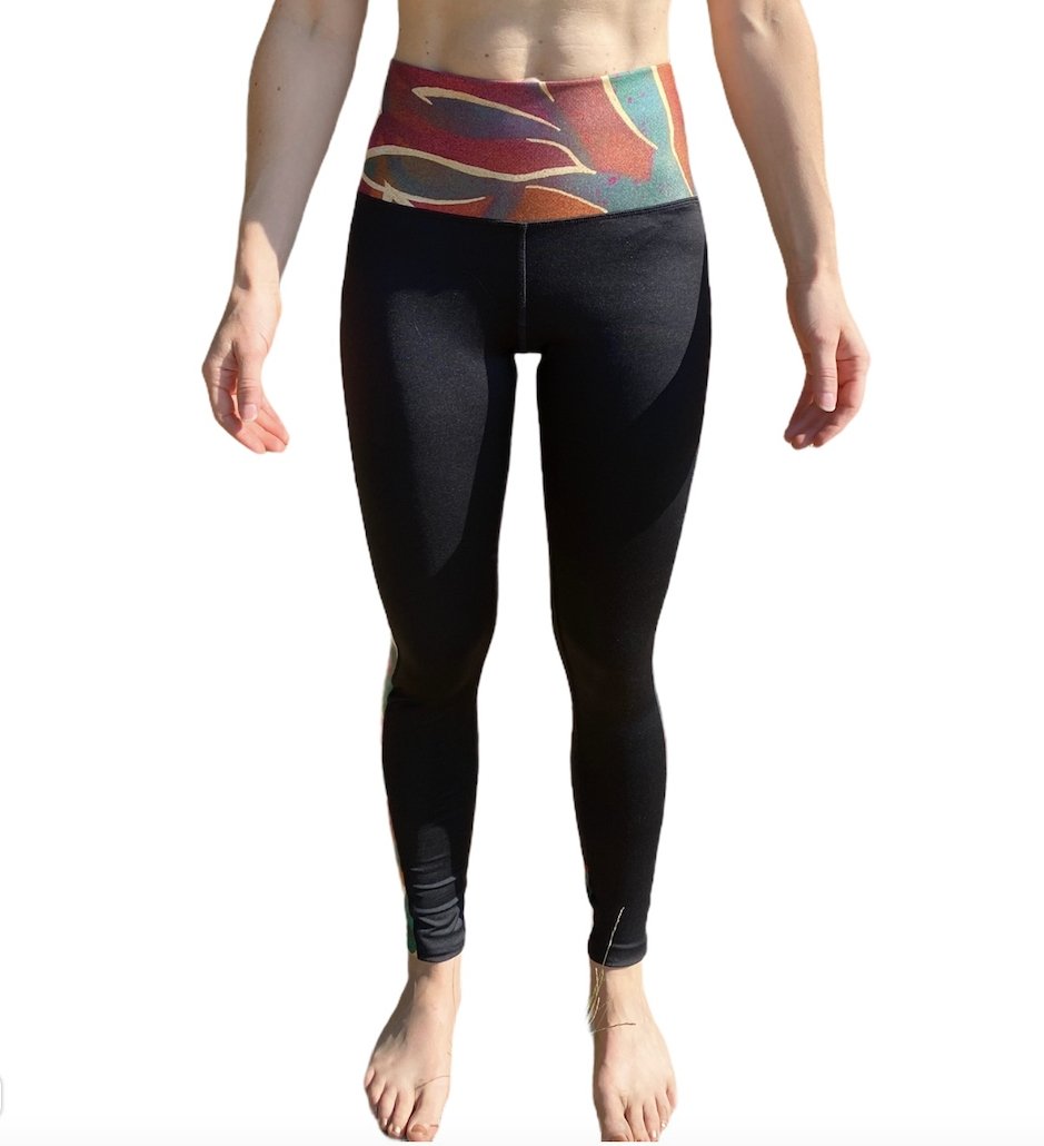 High-waisted Jungle Yoga Leggings with Pockets featuring jungle panel details and a wide waistband, perfect for workouts and casual wear.