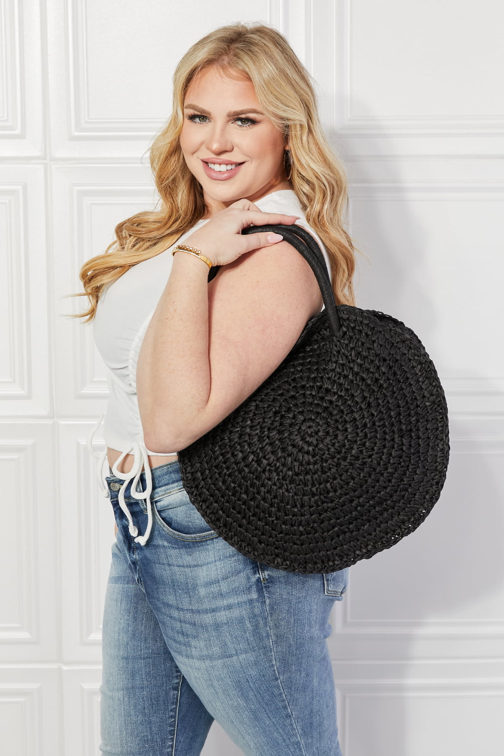 Justin Taylor Beach Date Straw Rattan Handbag in Black, handwoven with 100% paper, featuring a large size and stylish solid black design.