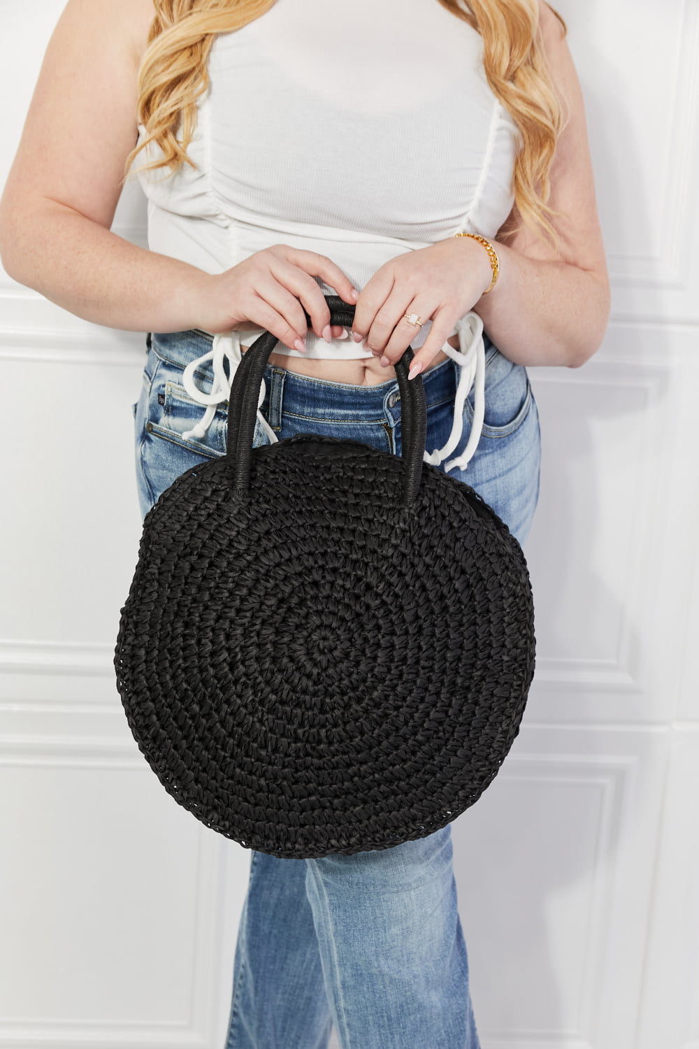 Justin Taylor Beach Date Straw Rattan Handbag in Black, handwoven with 100% paper, featuring a large size and stylish solid black design.