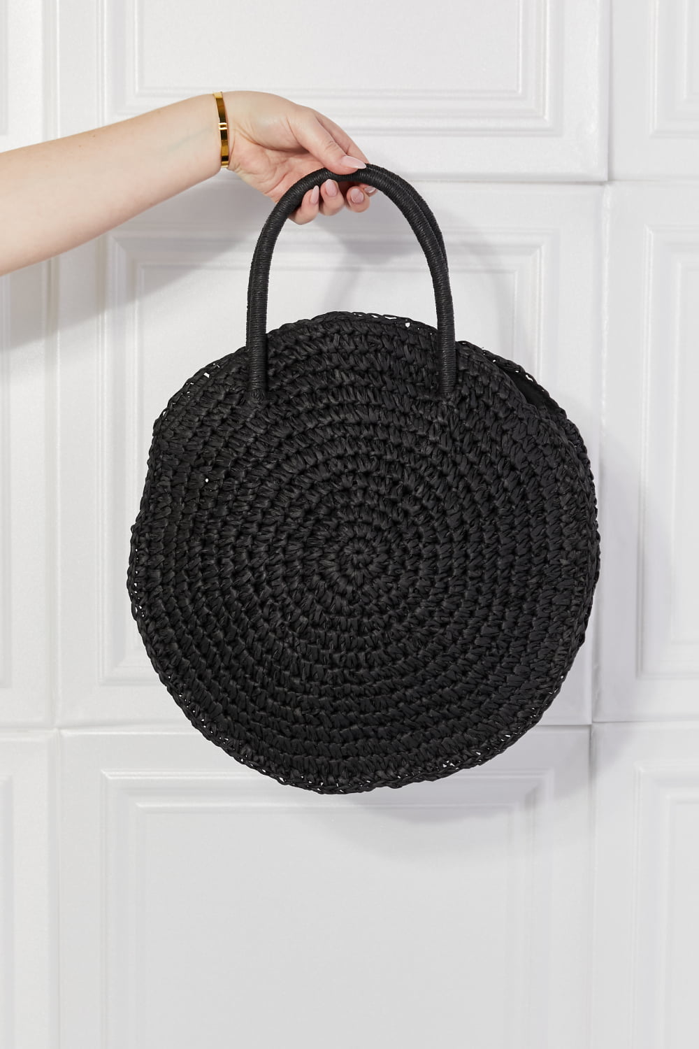 Justin Taylor Beach Date Straw Rattan Handbag in Black, handwoven with 100% paper, featuring a large size and stylish solid black design.