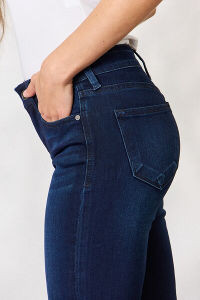 Kancan Full Size Mid Rise Flare Jeans showcasing a classic mid-rise fit and super stretch denim for comfort.