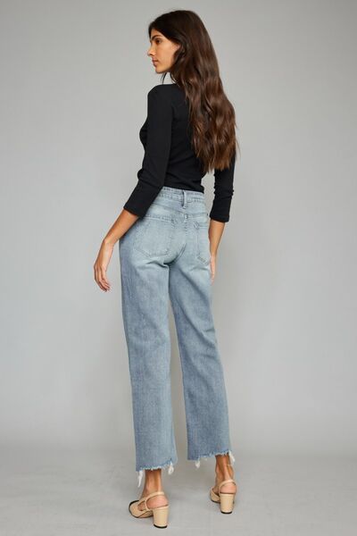 Kancan High Waist Raw Hem Cropped Wide Leg Jeans showcasing a trendy design with a raw hem and wide leg silhouette.