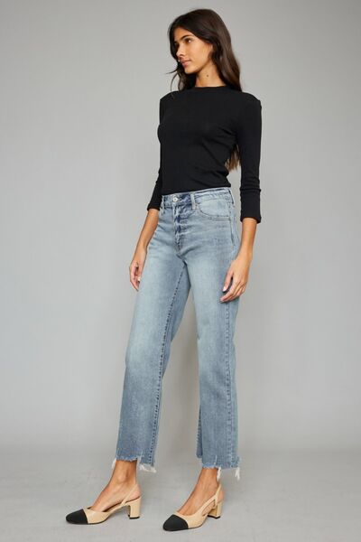 Kancan High Waist Raw Hem Cropped Wide Leg Jeans showcasing a trendy design with a raw hem and wide leg silhouette.