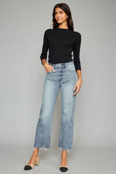 Kancan High Waist Raw Hem Cropped Wide Leg Jeans showcasing a trendy design with a raw hem and wide leg silhouette.