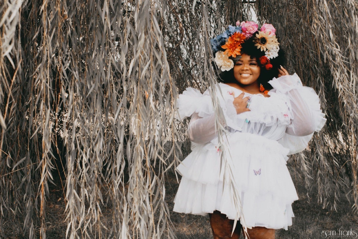 The Kayla Dress featuring soft fluffy ruffles and a zipper back, made from high-quality tulle, perfect for various occasions.