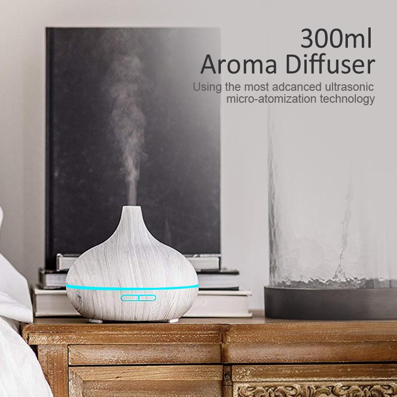 KBAYBO 300ml Electric Humidifier in white, featuring ultrasonic mist technology and 7 LED colors for aromatherapy and air purification.