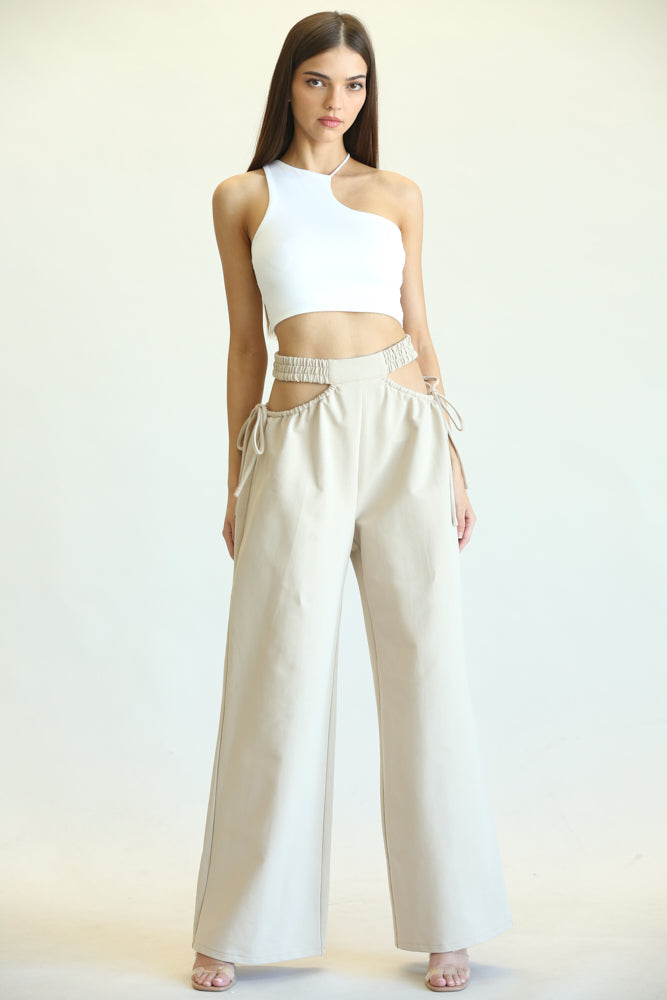 Kelly High Waisted Cut Out Pants featuring side cutouts and a wide-leg fit, made from a soft cotton blend fabric.