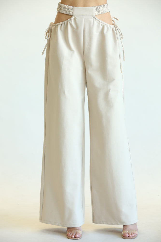 Kelly High Waisted Cut Out Pants featuring side cutouts and a wide-leg fit, made from a soft cotton blend fabric.