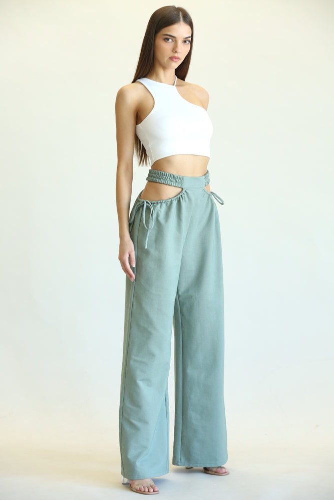 Kelly High Waisted Cut Out Pants featuring side cutouts and a wide-leg fit, made from a soft cotton blend fabric.