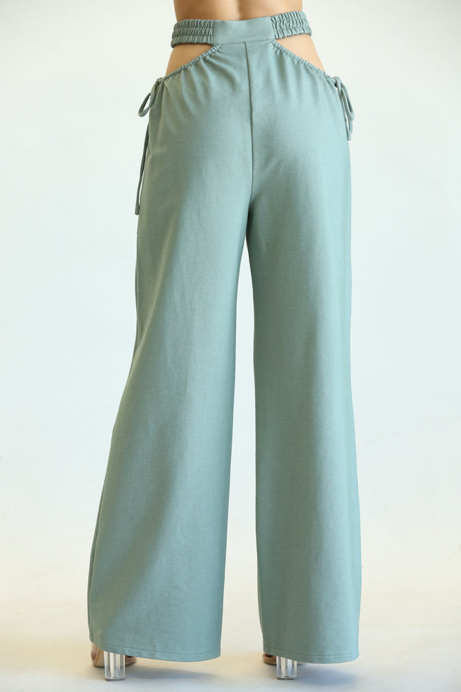 Kelly High Waisted Cut Out Pants featuring side cutouts and a wide-leg fit, made from a soft cotton blend fabric.