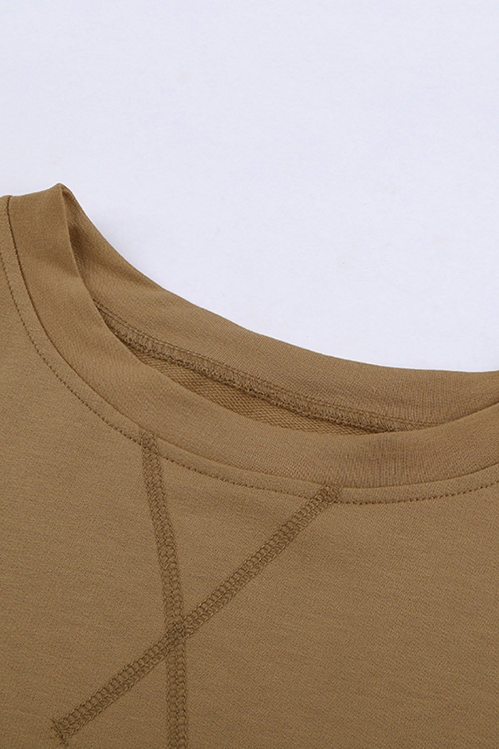 Khaki crew neck long sleeve sweatshirt displayed on a mannequin, showcasing its relaxed fit and stylish design.