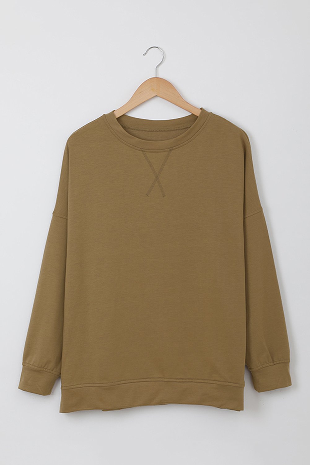 Khaki crew neck long sleeve sweatshirt displayed on a mannequin, showcasing its relaxed fit and stylish design.