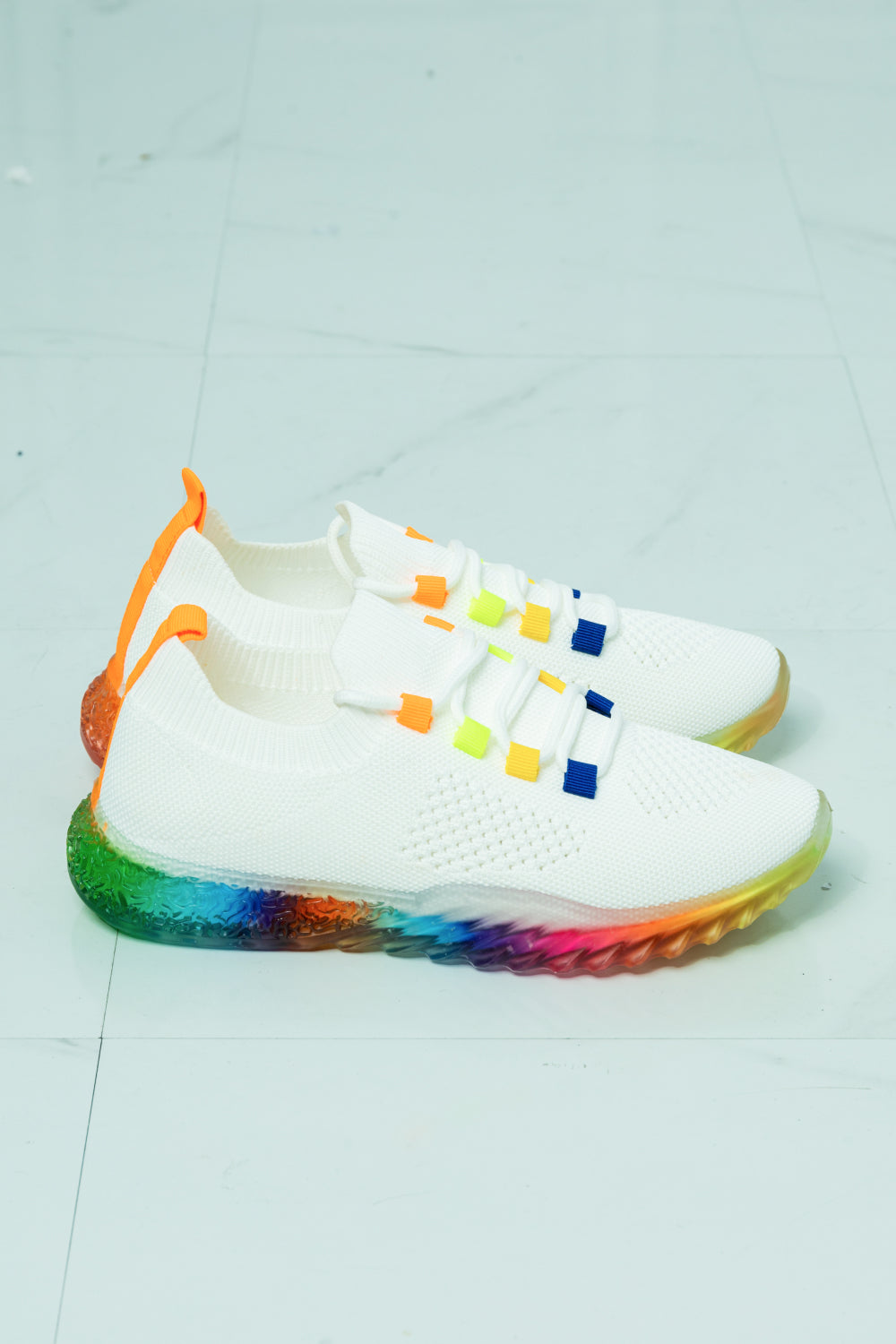 Colorful Kick It To The Limit Rainbow Sole Sneaker with a vibrant rainbow sole and fabric upper, designed for comfort and style.