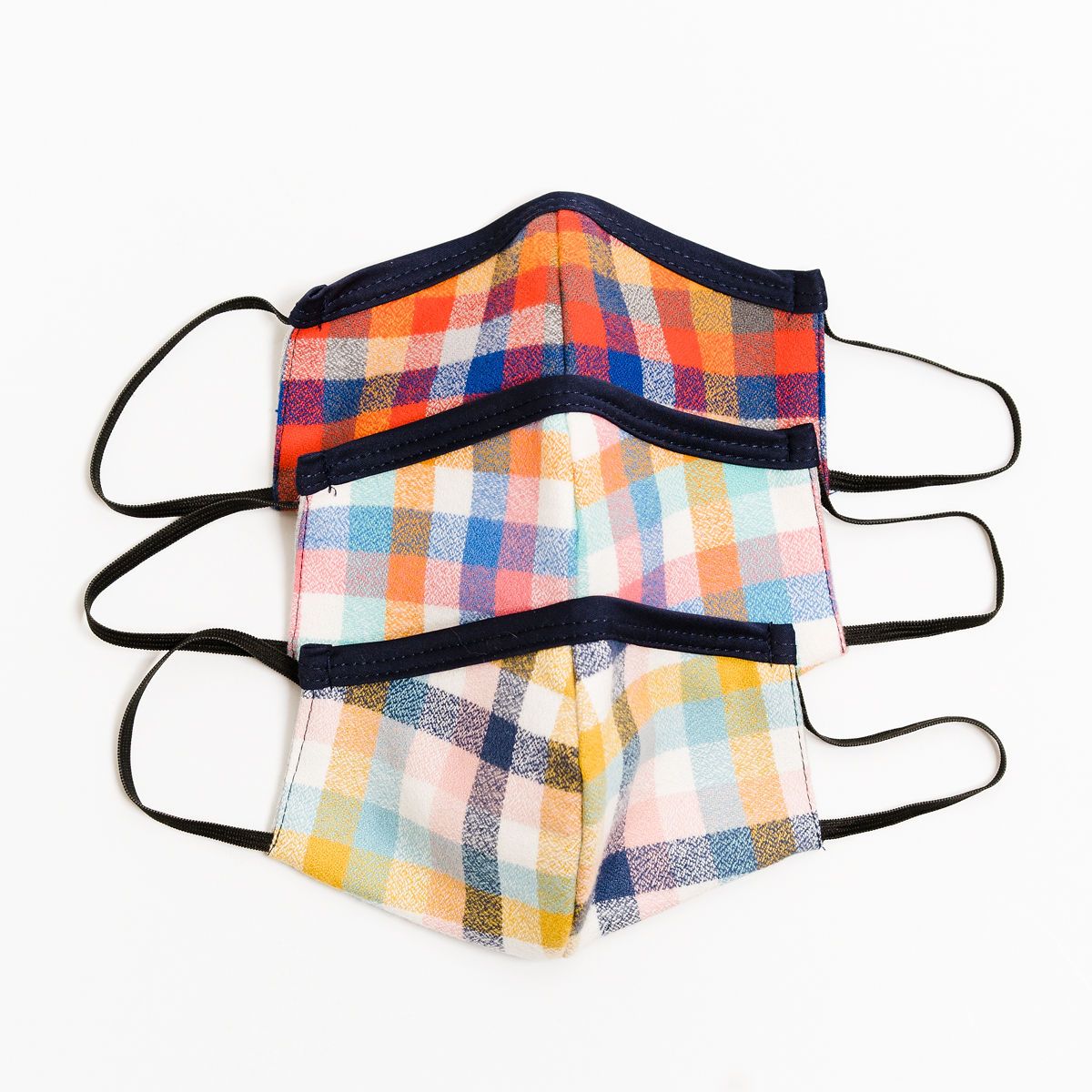 Kids 3 pack flannel masks for ages 8-12, featuring fun designs and made from breathable cotton for comfort.