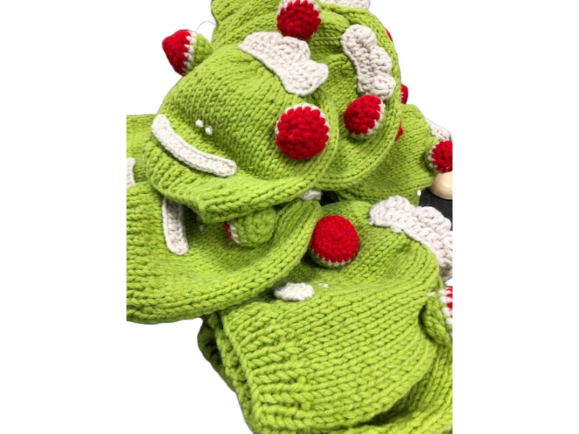 Hand-knitted frog wool beanie cap for kids, featuring a playful design and cozy fit, perfect for ages 2-7.