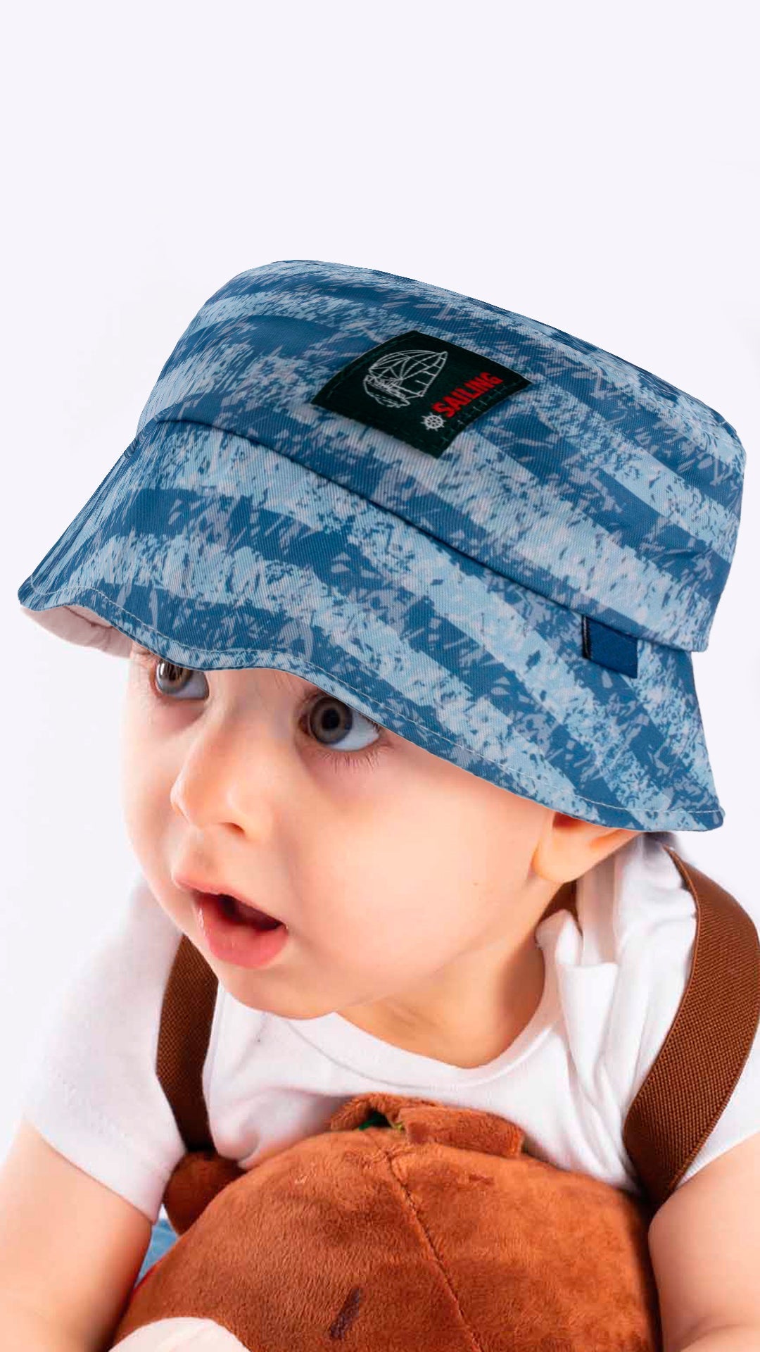 Kids Fedora Hat in vibrant sailing tie-dye design, suitable for ages 4-8, made from soft cotton and polyester blend.