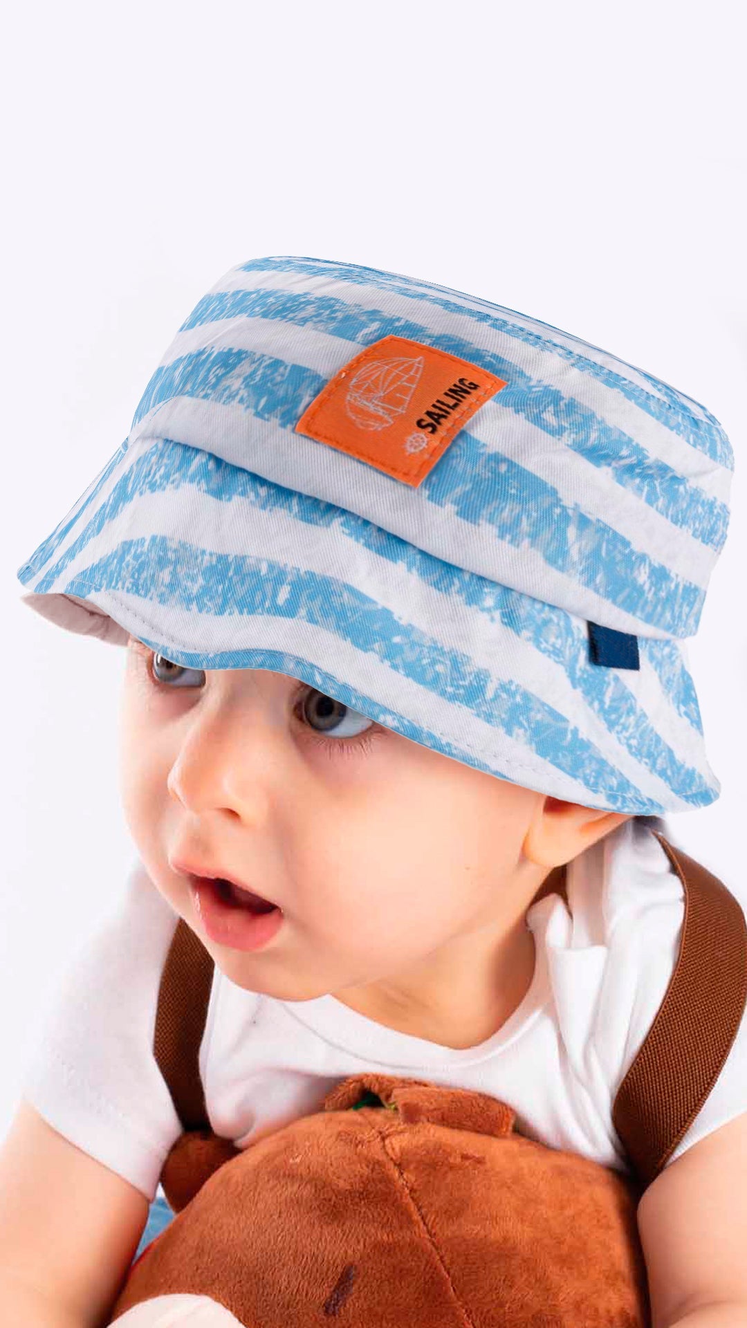 Kids Fedora Hat in vibrant sailing tie-dye design, suitable for ages 4-8, made from soft cotton and polyester blend.