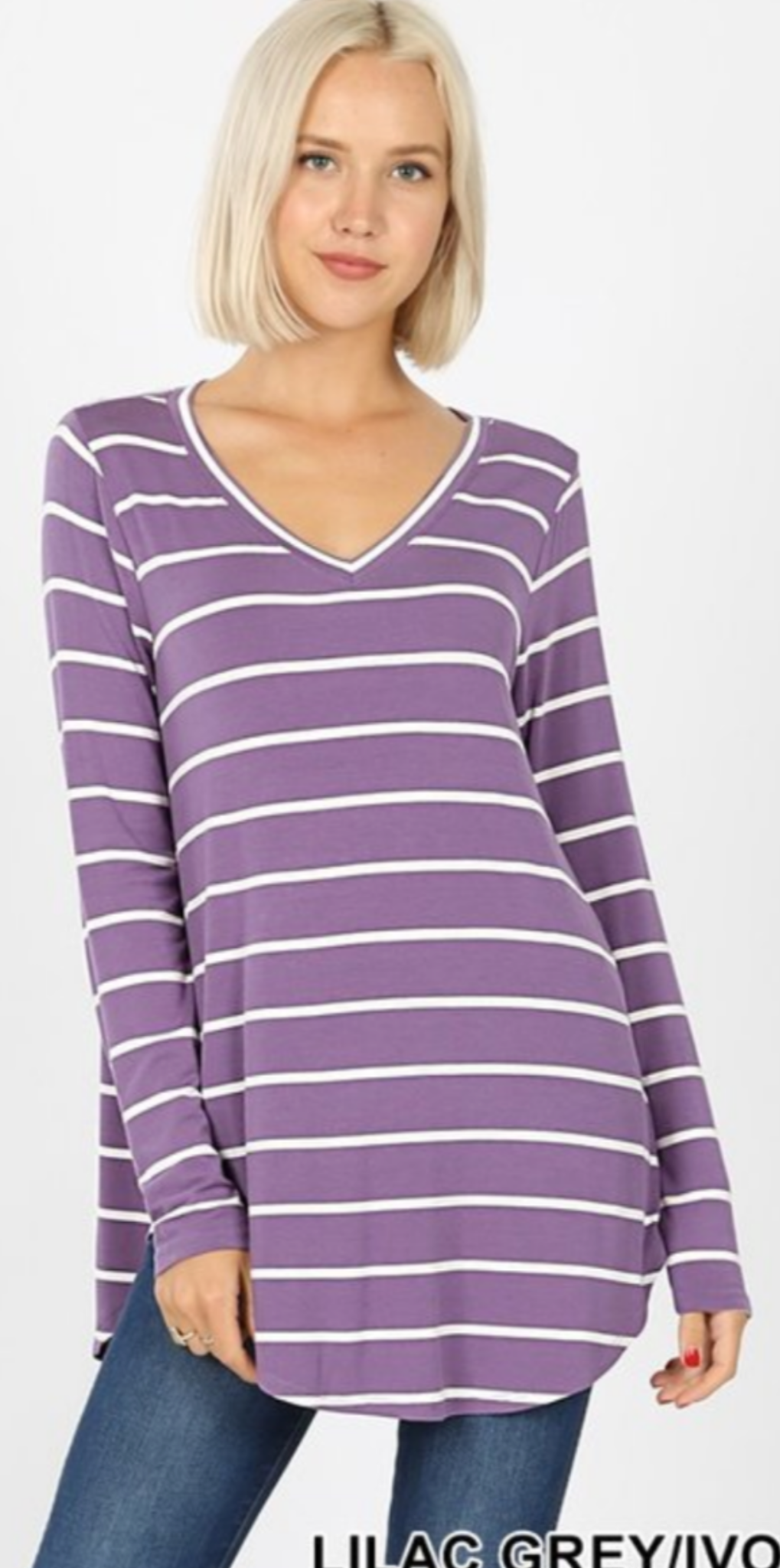 A stylish purple knit striped tunic perfect for spring, featuring a comfortable fit and versatile design.