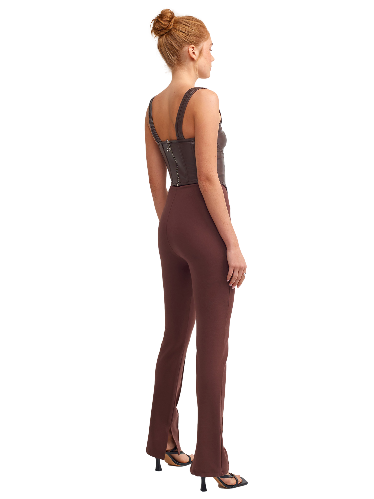 A pair of stylish knitted trousers featuring a slit detail, showcasing a soft fabric blend of viscose, nylon, and elastane.