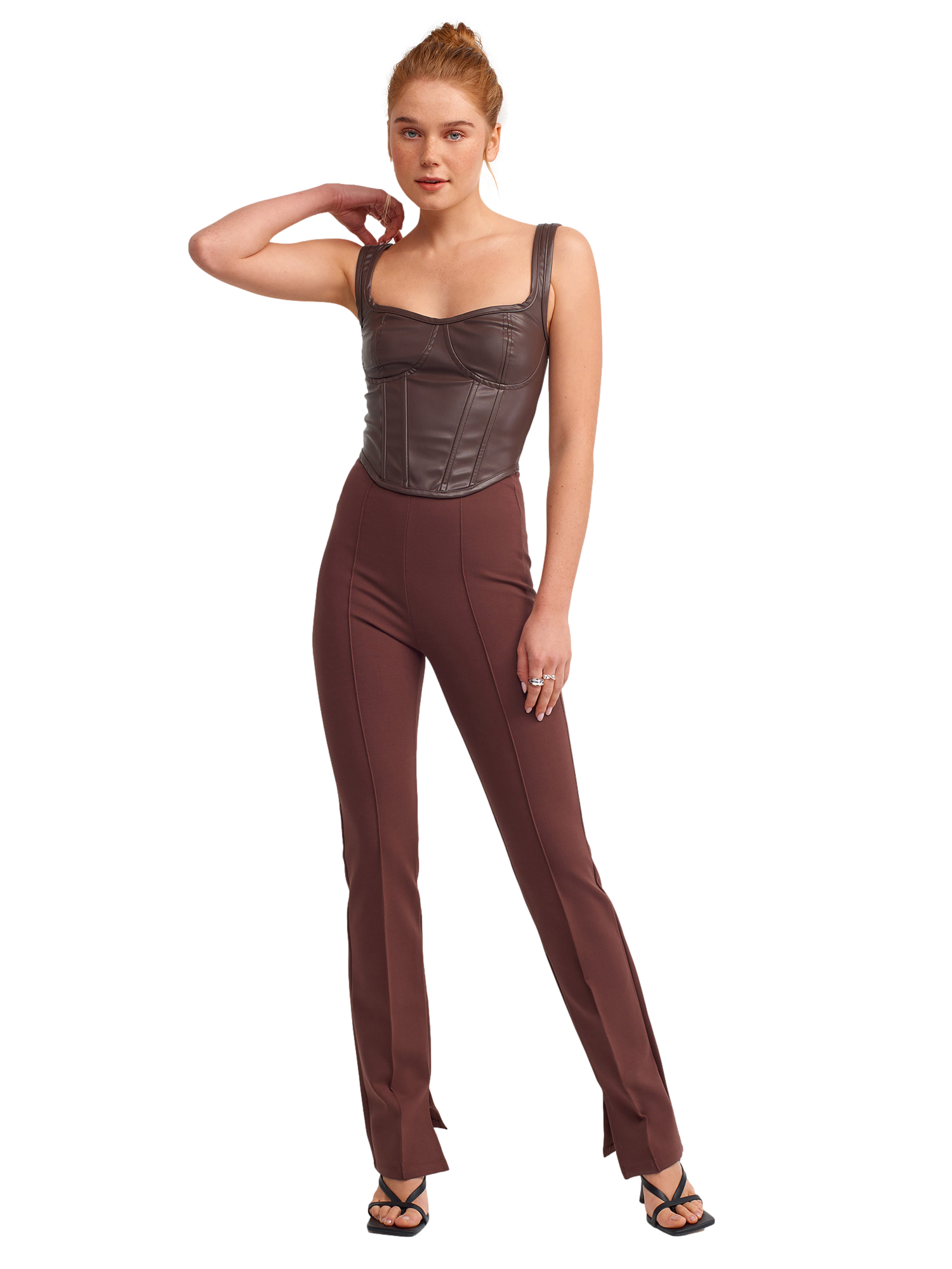 A pair of stylish knitted trousers featuring a slit detail, showcasing a soft fabric blend of viscose, nylon, and elastane.