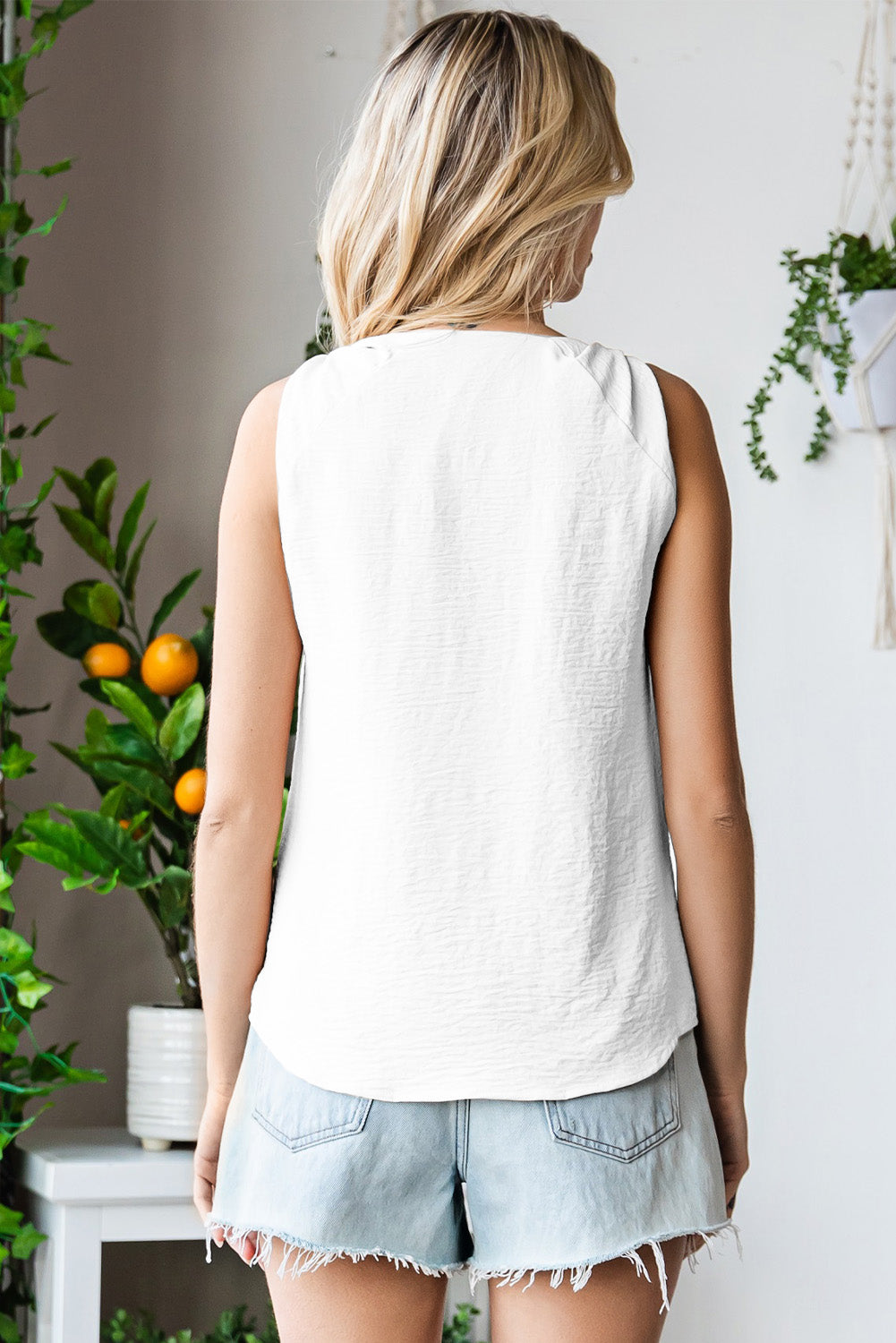 Knot Detail V-Neck Tank in solid color, showcasing a stylish knot at the front and a flattering V-neckline, perfect for casual wear.