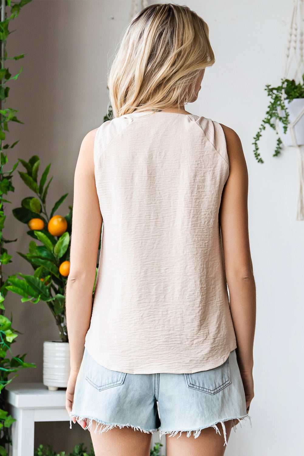 Knot Detail V-Neck Tank in solid color, showcasing a stylish knot at the front and a flattering V-neckline, perfect for casual wear.