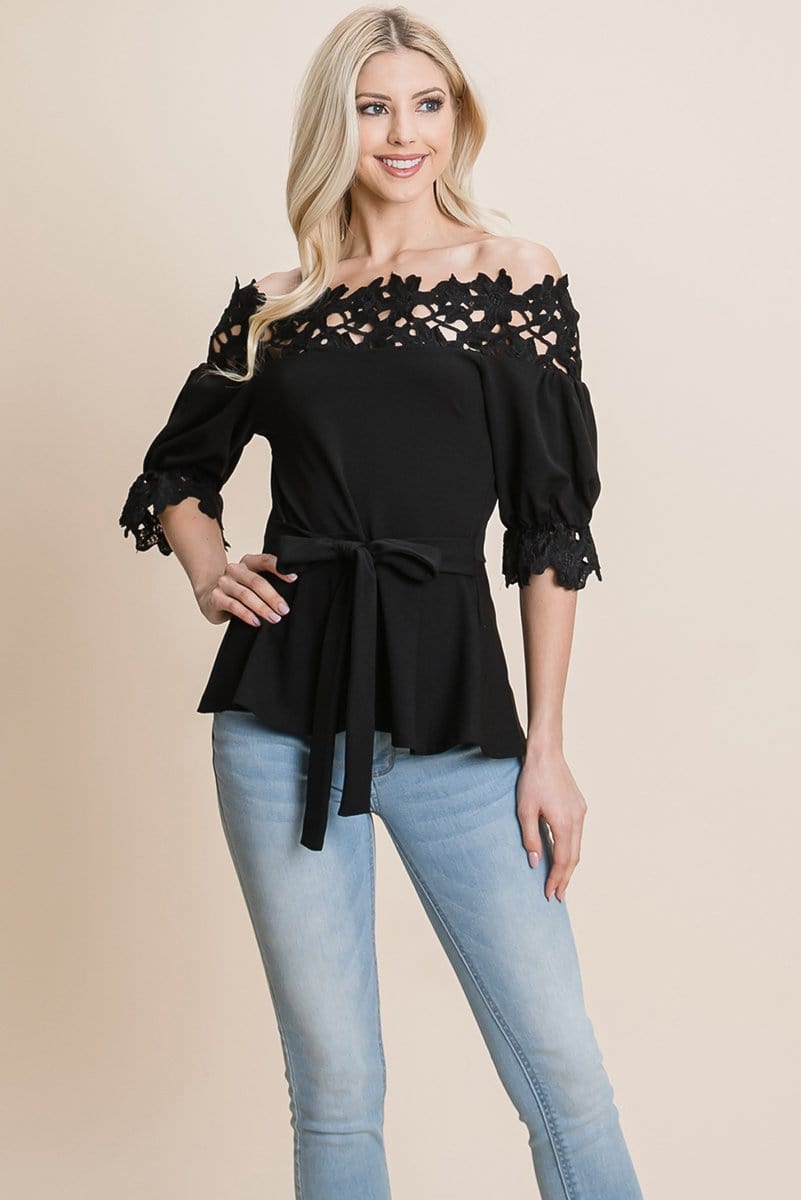 A stylish Lace Crochet Self Belted Off The Shoulder Top featuring floral lace applique, half lace trim sleeves, and a hidden back zipper.